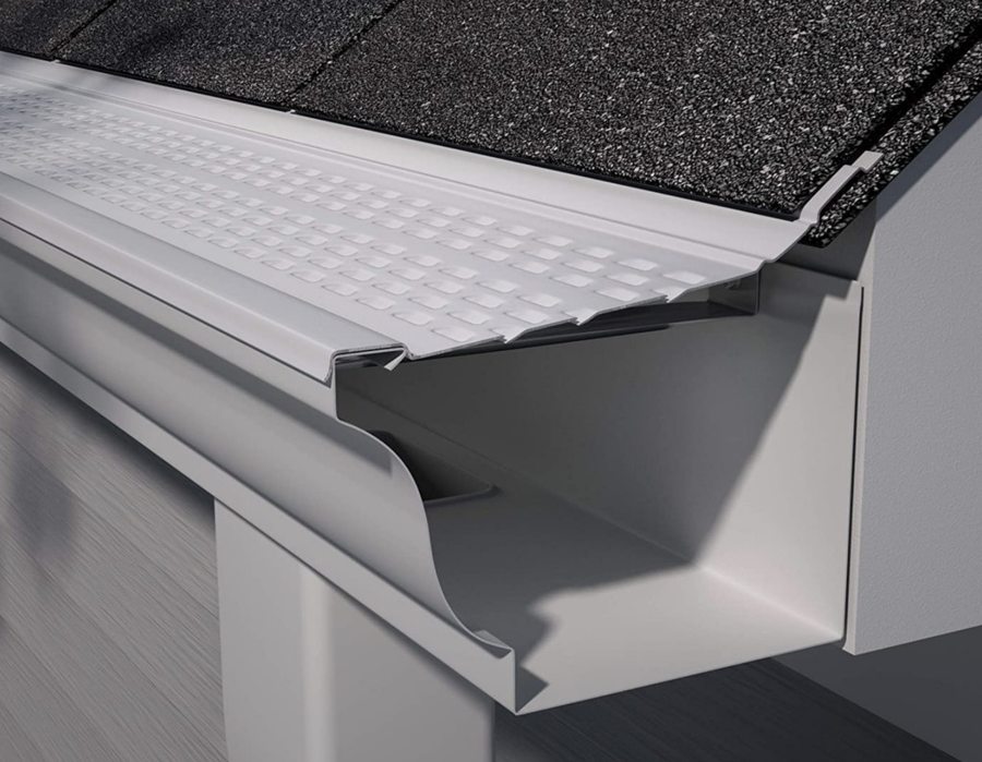Leaf guards and gutter covers being installed